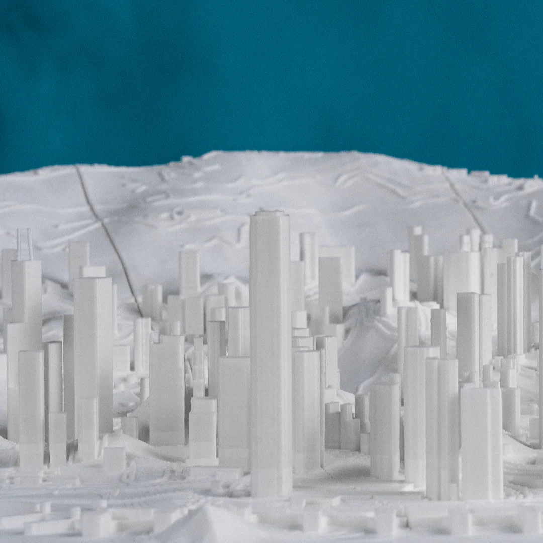 Close view of clustered towers in a Hong Kong city relief map.