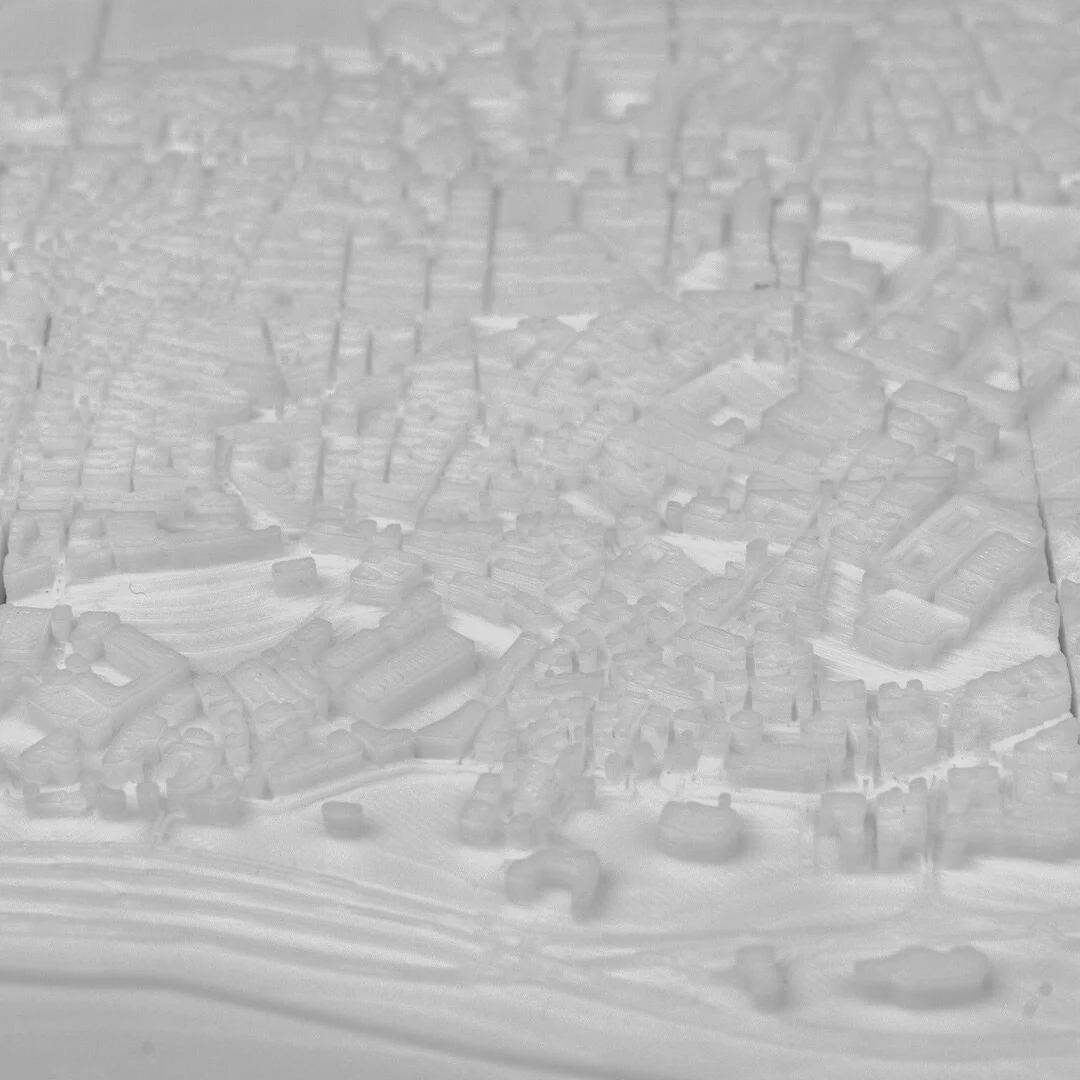 Angled detail of raised waterfront buildings in an Istanbul city relief map.