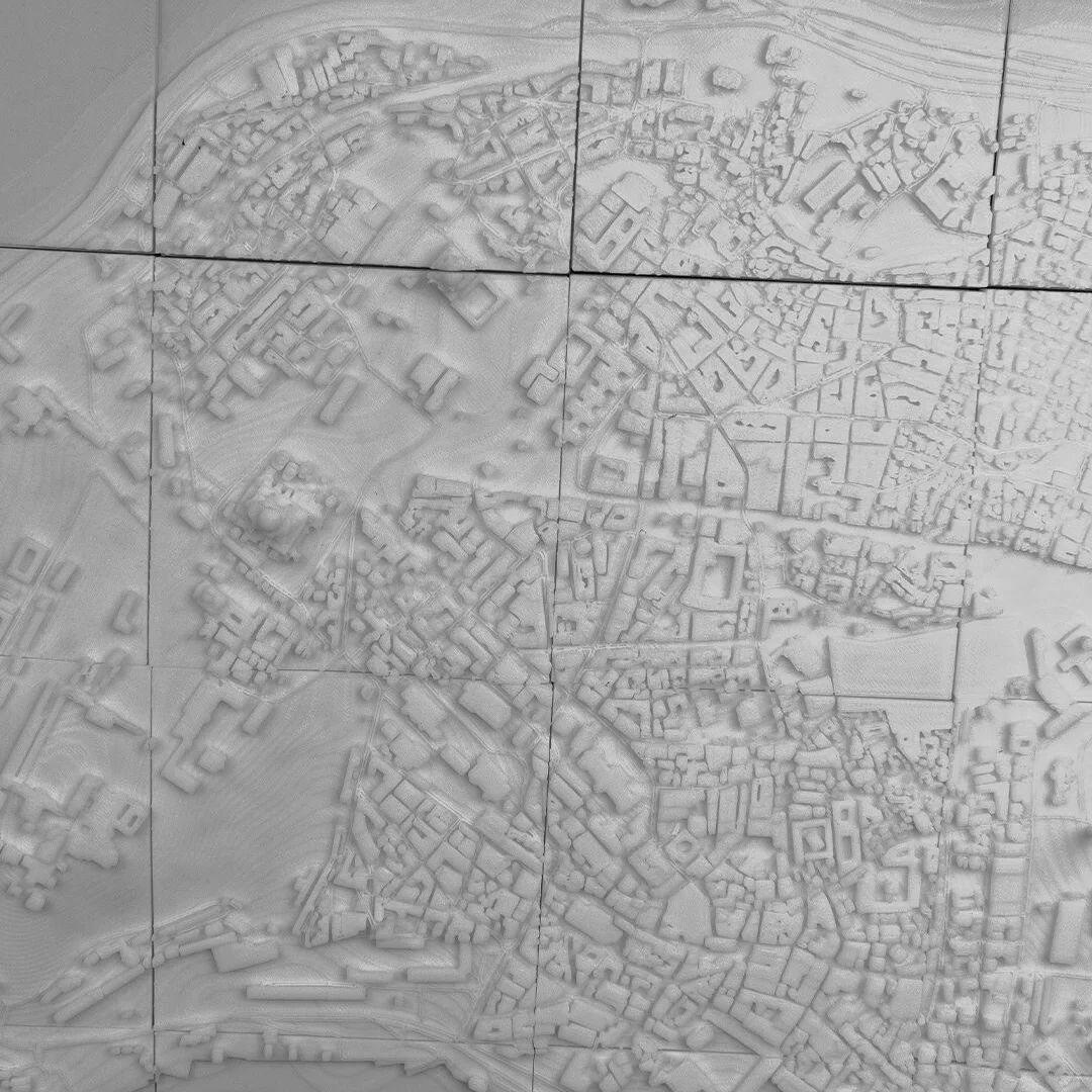 Overhead view of an Istanbul relief map assembled from square panels.