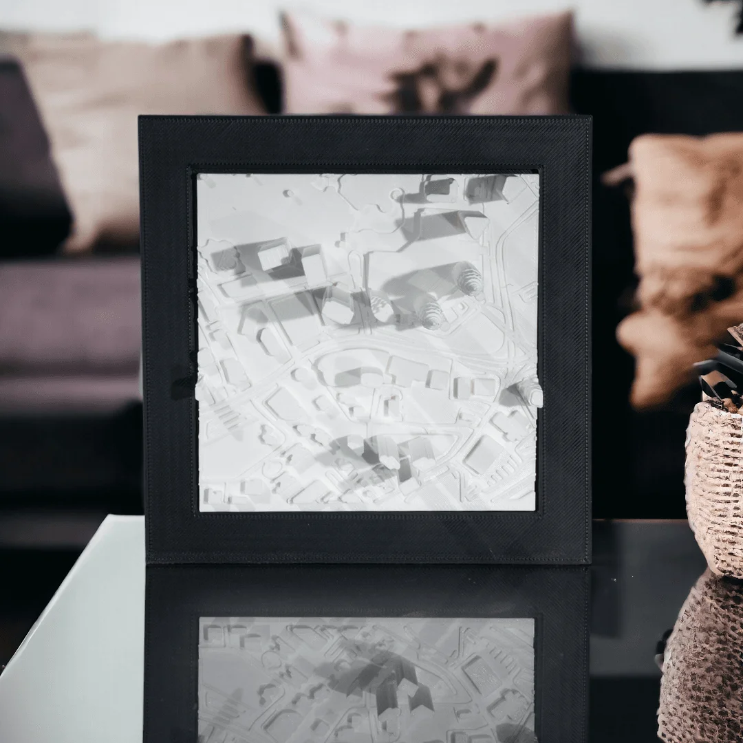 Framed Kuala Lumpur city relief map displayed on a tabletop.