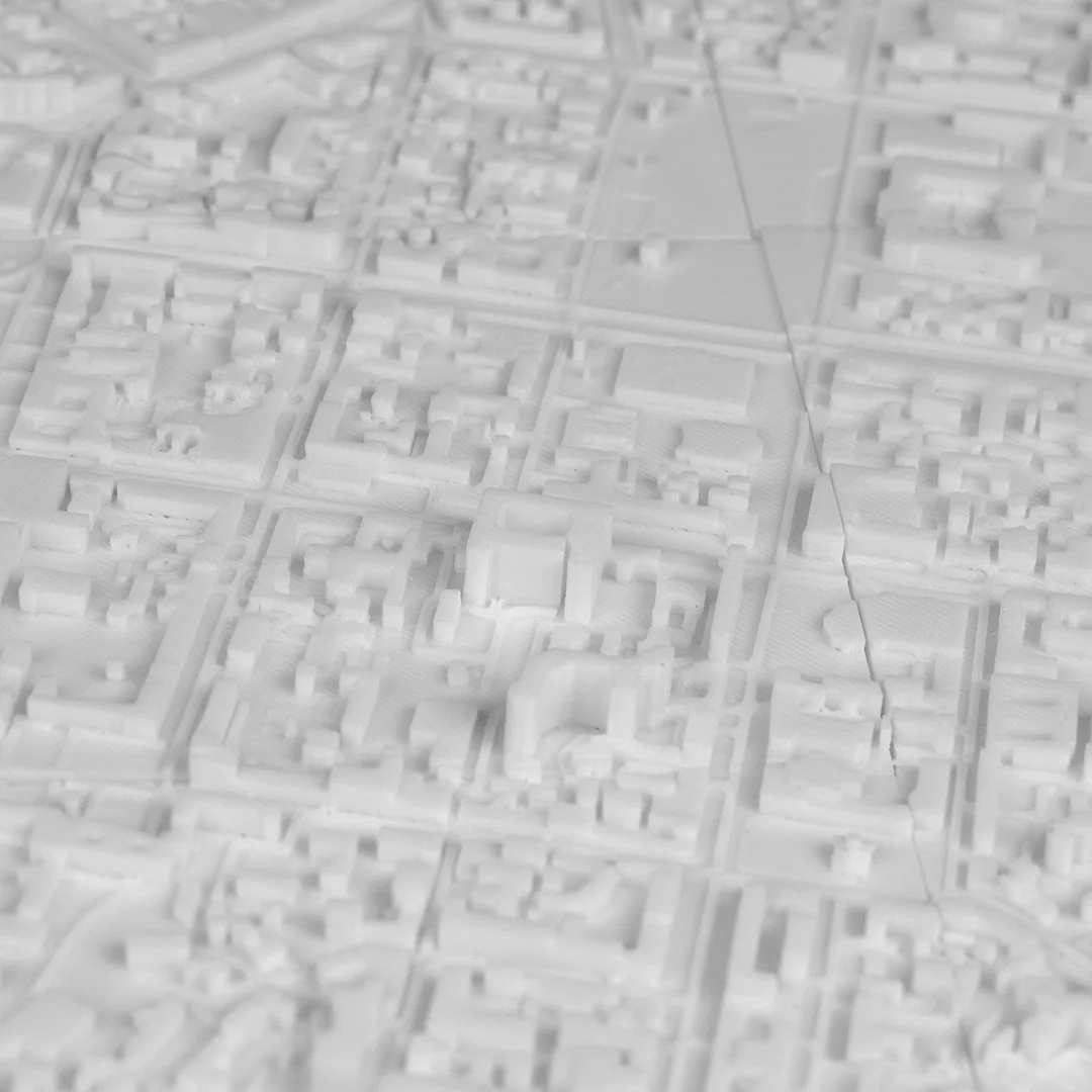 Close overhead view of street blocks in a Kyiv city relief map.