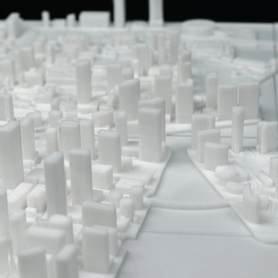 Low angled view along the waterfront of a Miami city relief map.