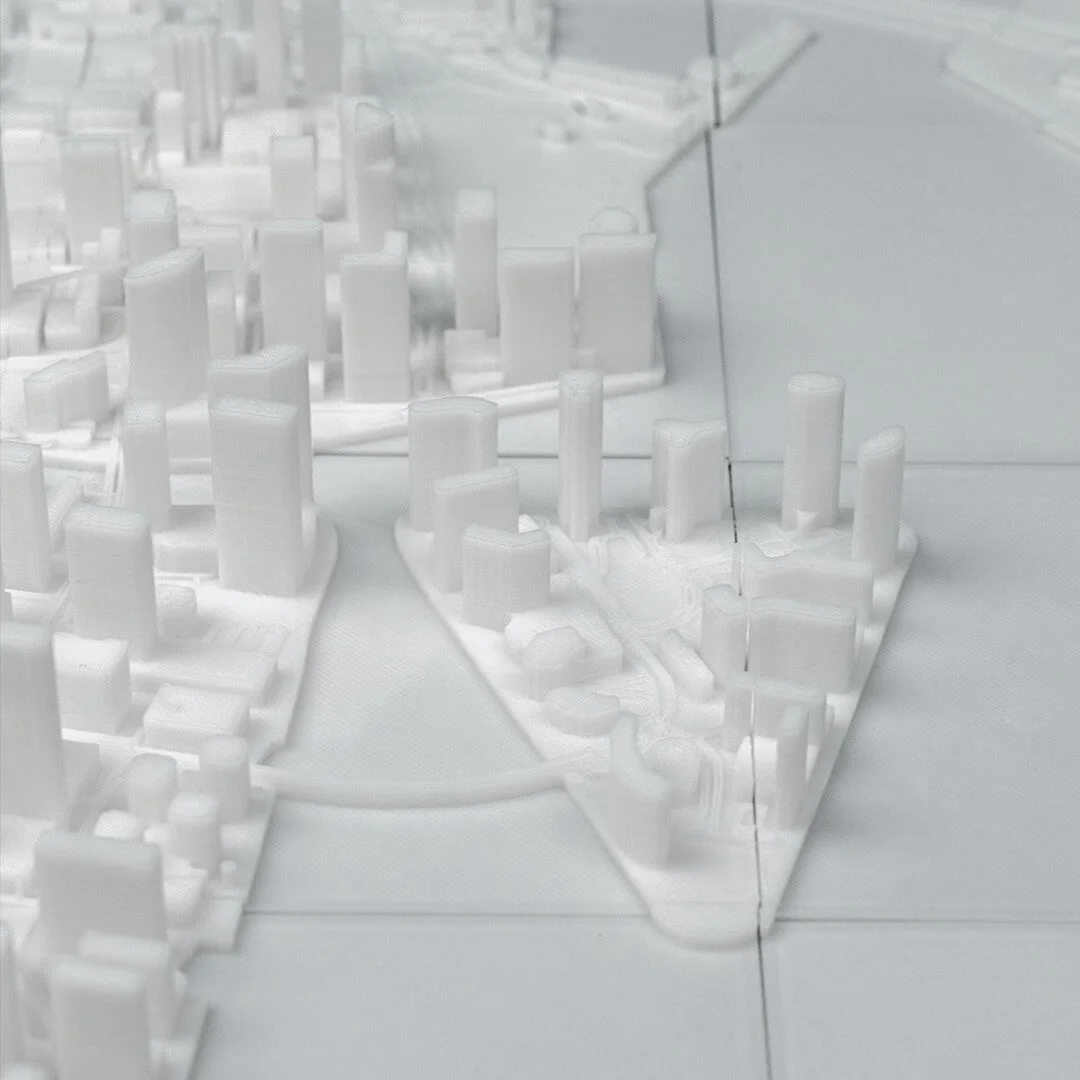 Close view of towers along the waterfront in a Miami city relief map.
