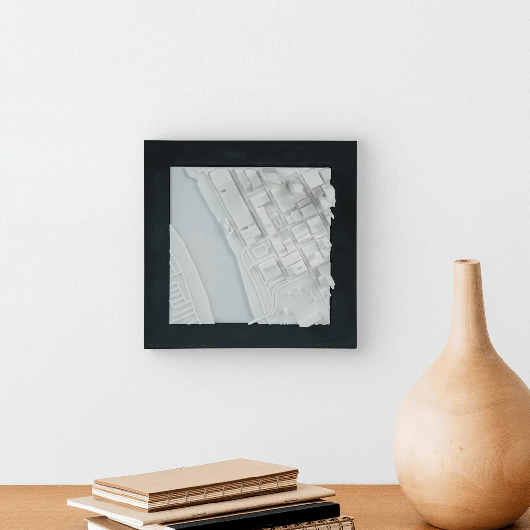 Framed Moscow city relief map displayed on a wall.