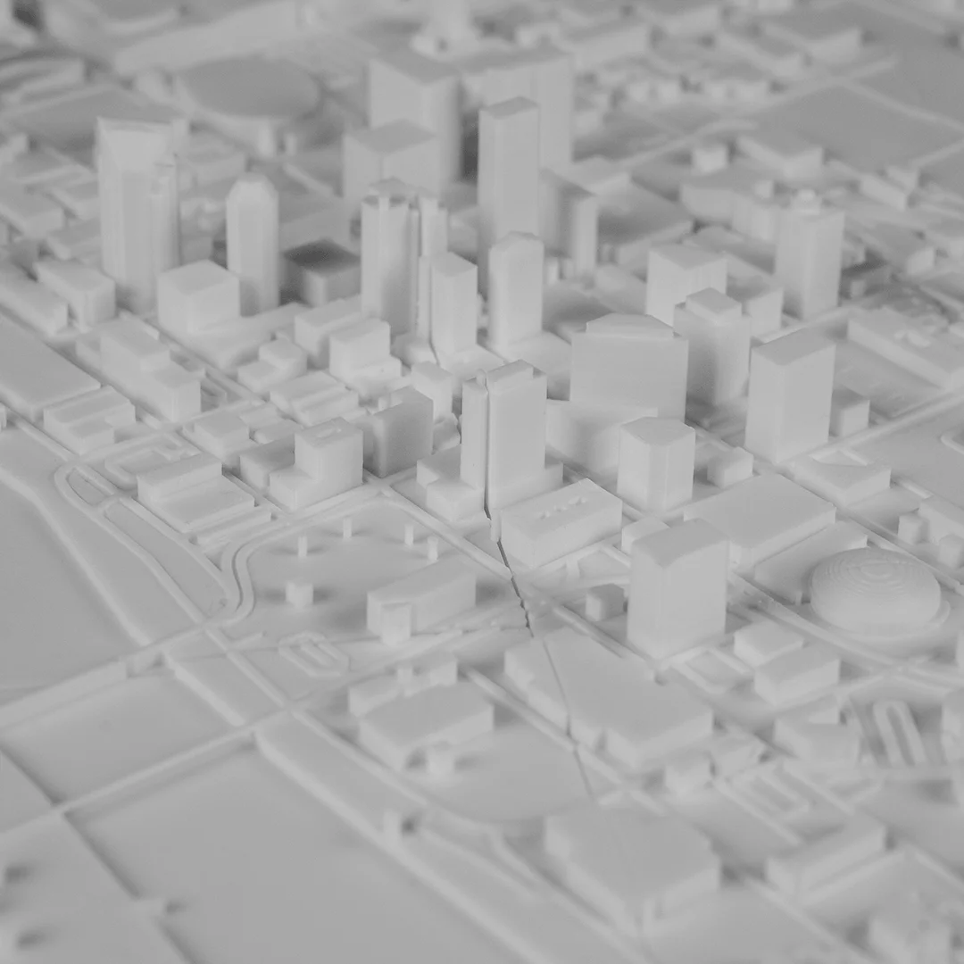 Close view of towers and surrounding buildings in a Moscow city relief map.