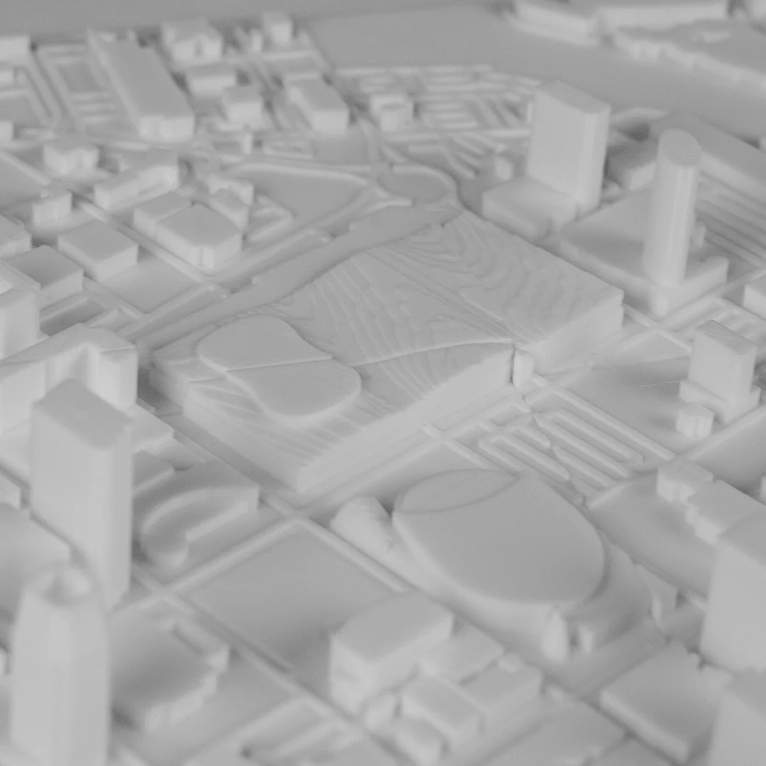 Angled detail of a stadium and nearby buildings in a Moscow relief map.