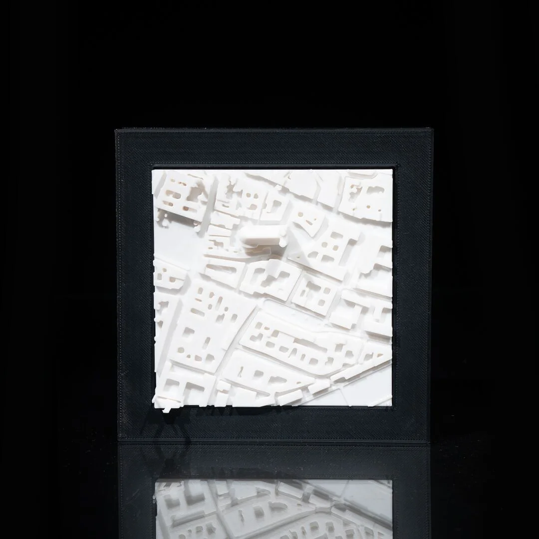 Framed Munich city relief map displayed upright.