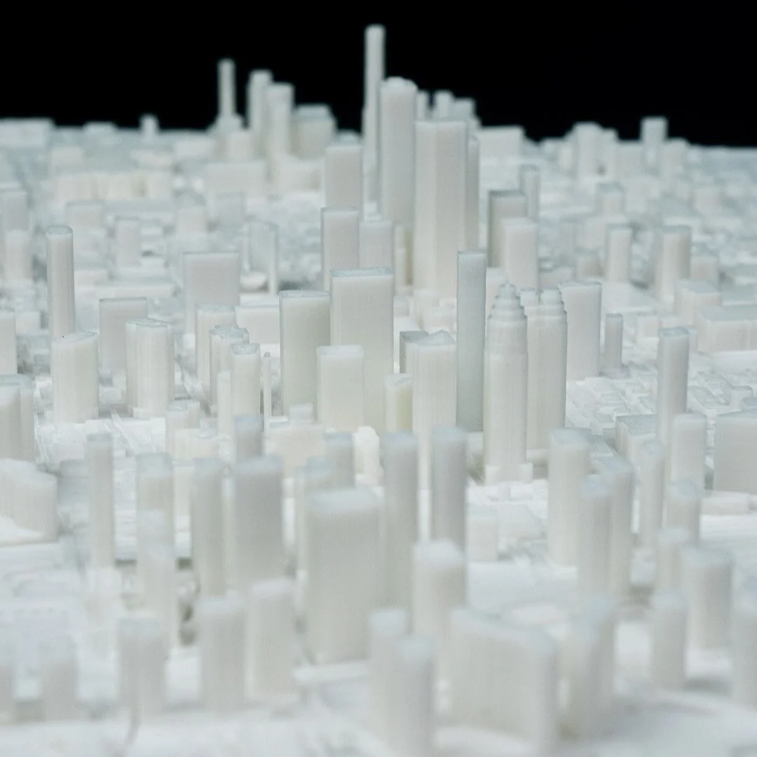 Low view across raised buildings in a Toronto city relief map.