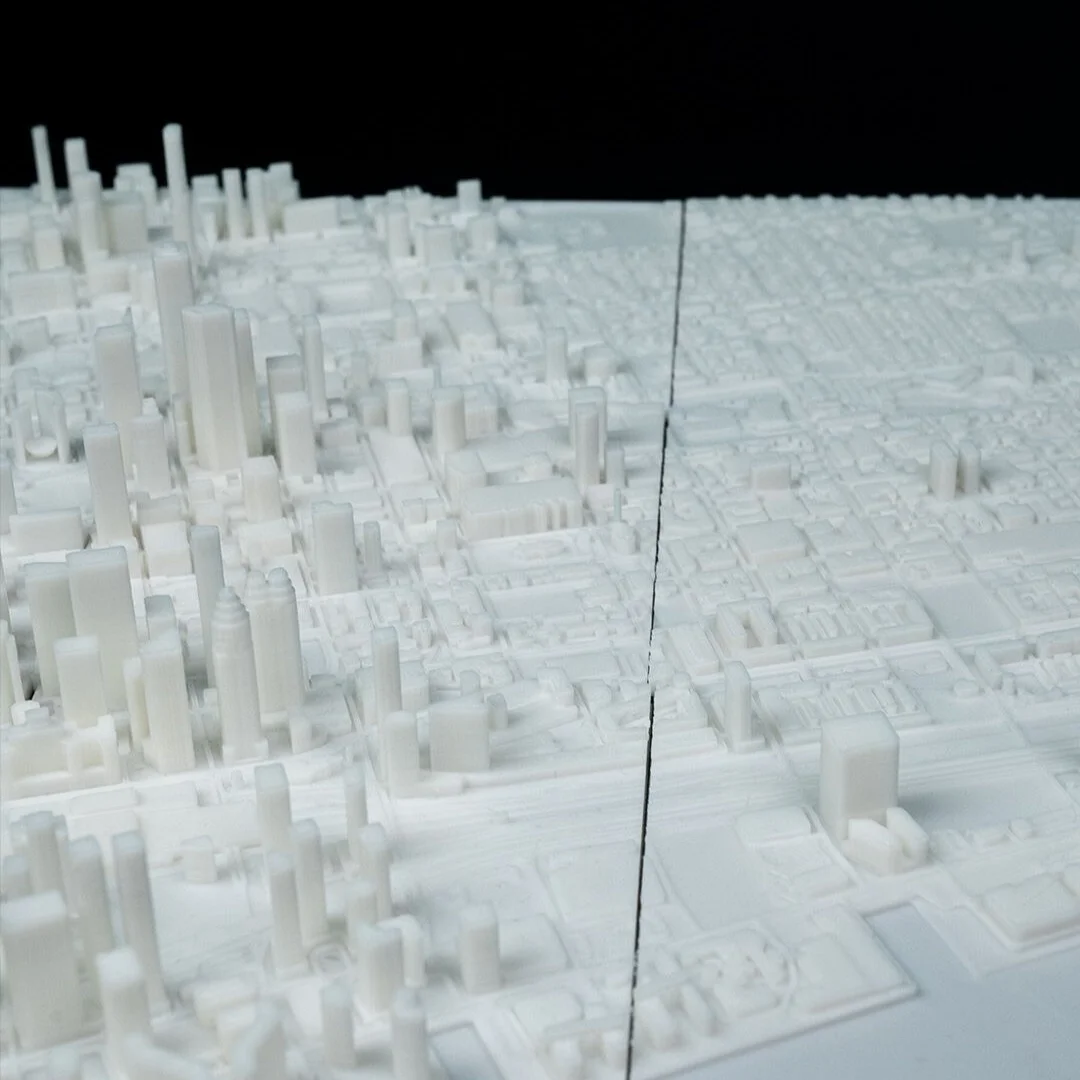 Wide angled view of a Toronto city relief map assembled from panels.