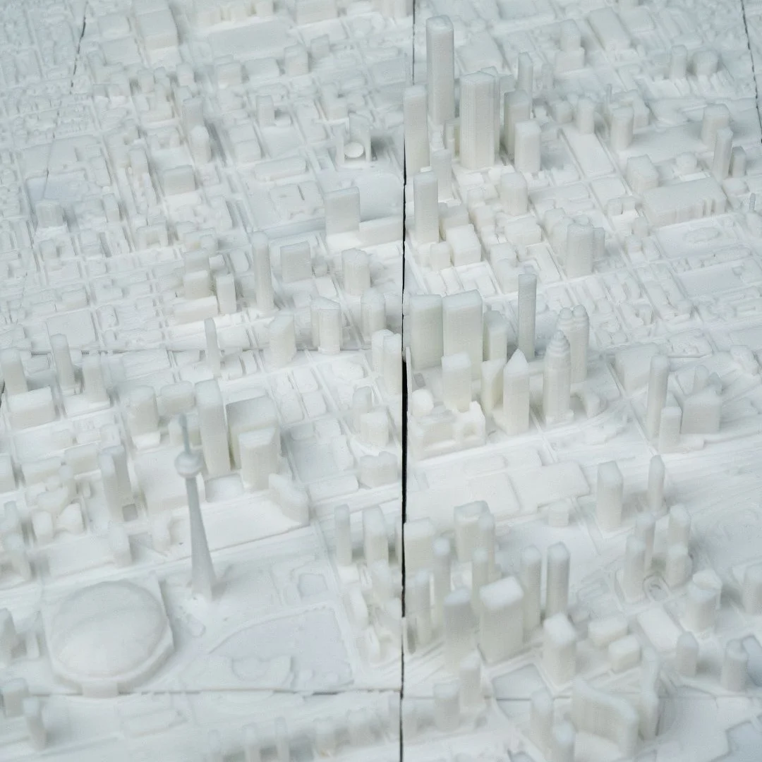 Overhead detail of buildings and stadium in a Toronto city relief map.