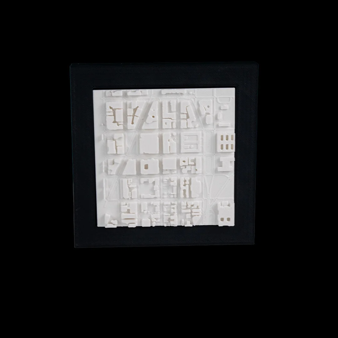 Front view of a framed Washington DC city relief map.