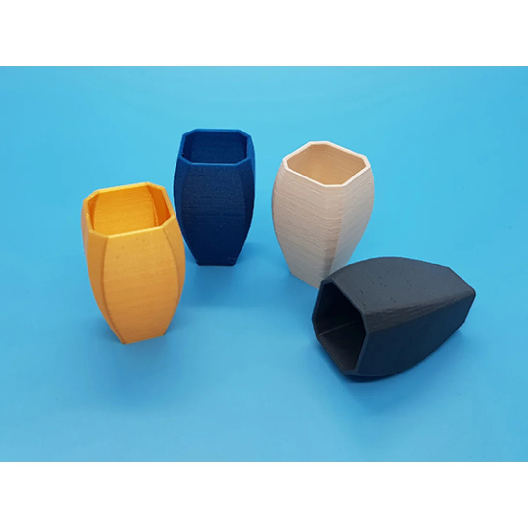 Curvy Vase models displayed together, showing their shape and open rims.