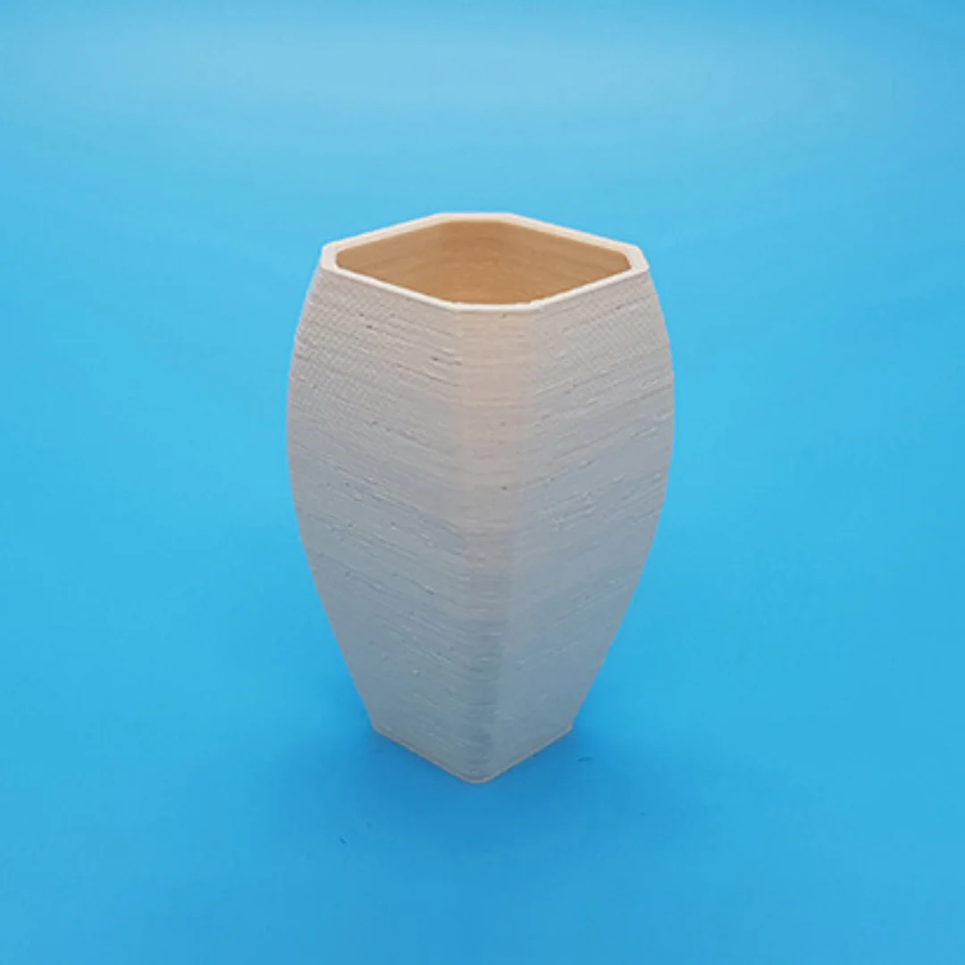 Curvy Vase showing its open rim and 3D printed surface.
