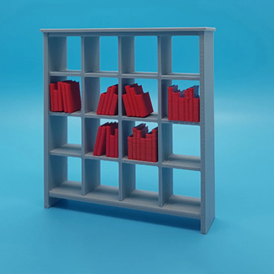Miniature books arranged on model shelving to illustrate their use in an interior scene.