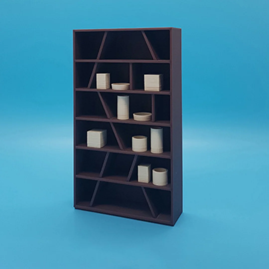 Miniature vases and boxes at 1:20 scale displayed on model shelving.
