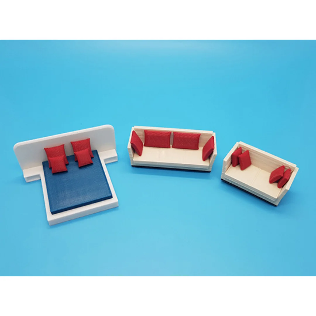 Miniature cushions at 1:50 scale shown on model furniture.