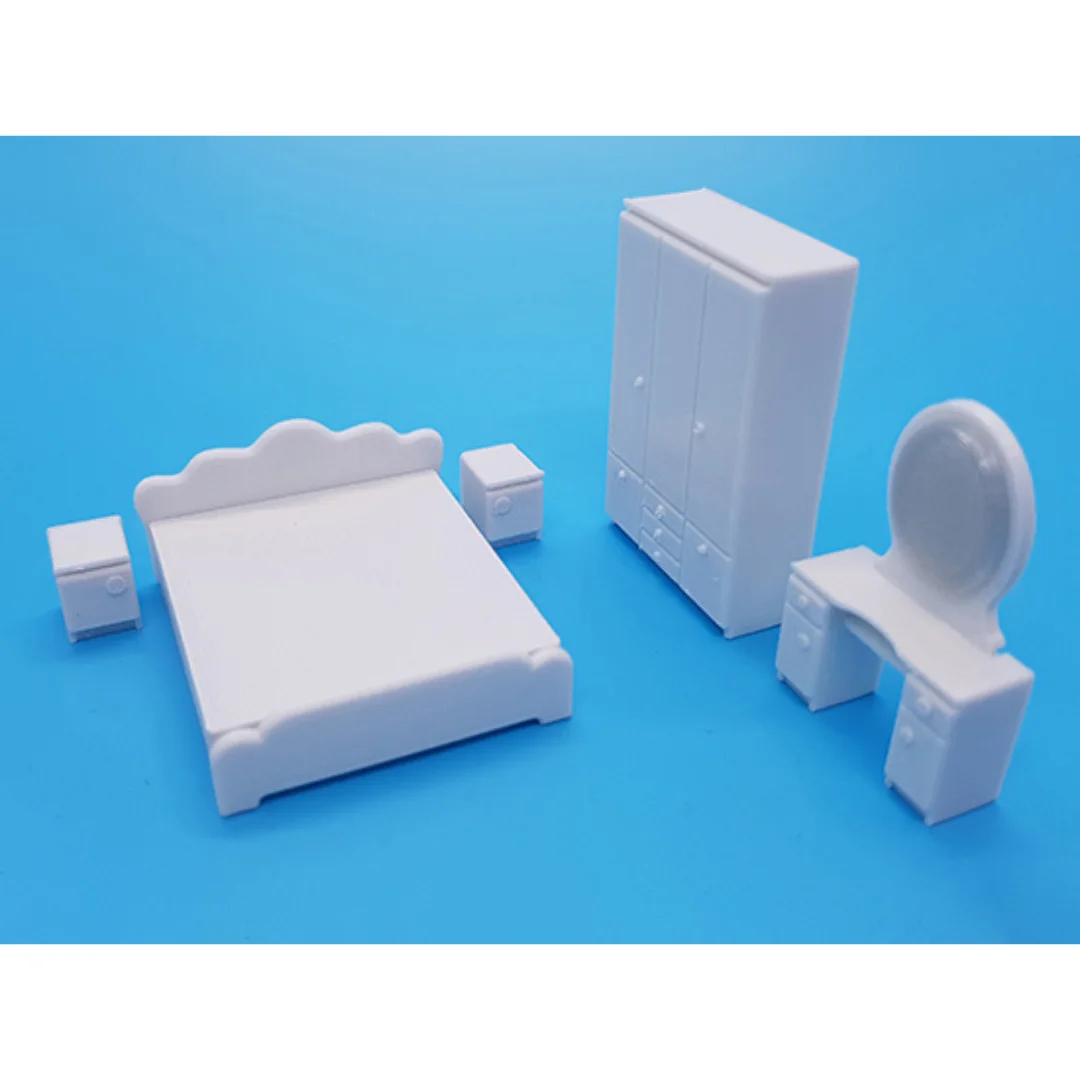 Classic miniature bedroom furniture set with bed, wardrobe and dressing mirror at 1:50 scale.