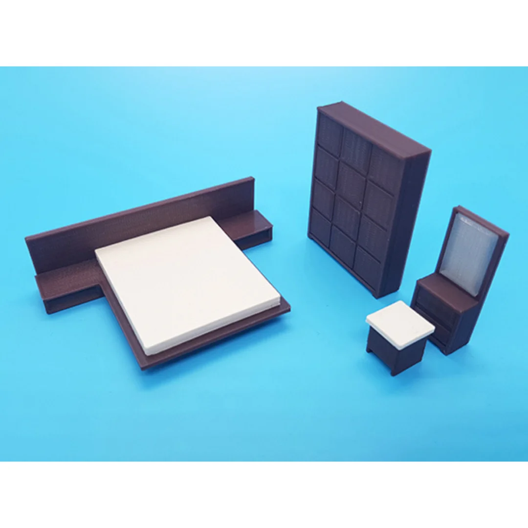 Cora miniature bedroom set at 1:50 scale, showing the bed, wardrobe and dressing mirror.