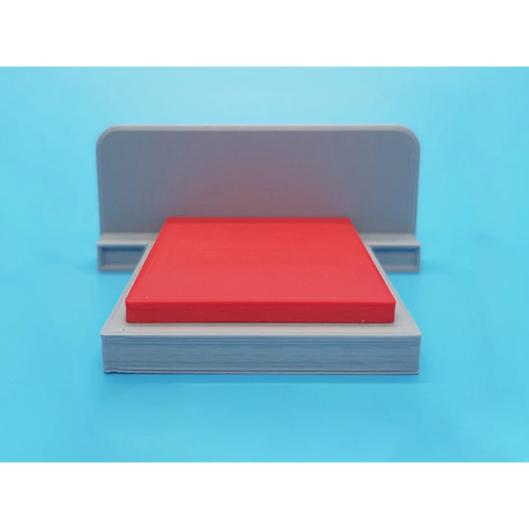 Aurora miniature bed at 1:50 scale, showing its headboard, mattress and base.