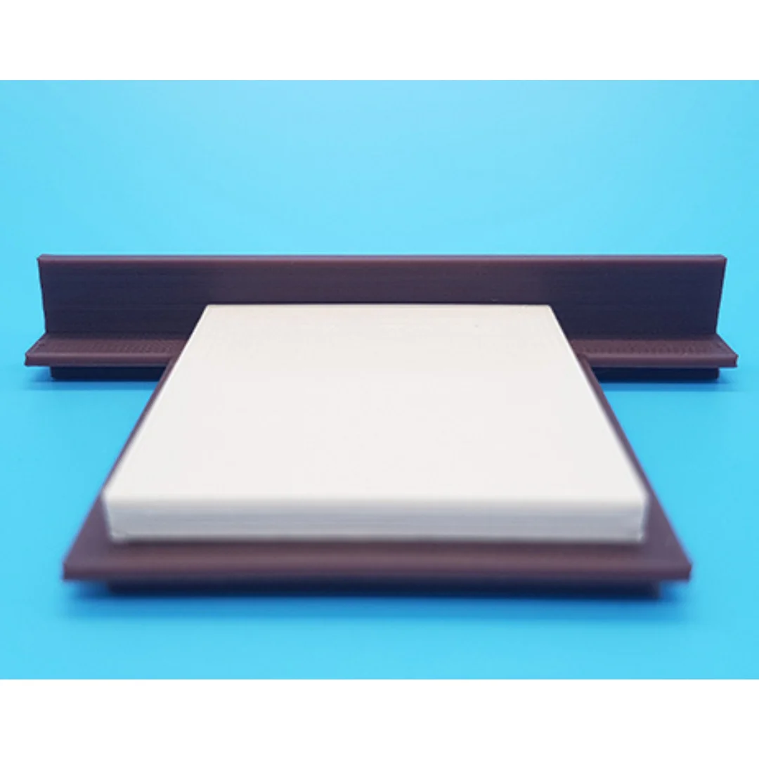 Chloe miniature bed at 1:50 scale, showing its headboard, mattress and base.