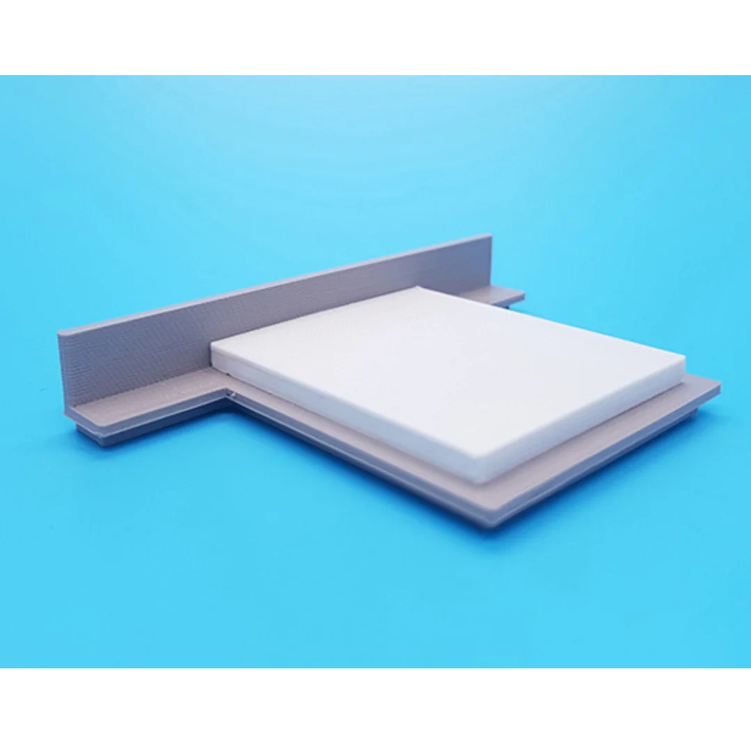 Chloe miniature bed at 1:50 scale, showing its headboard, mattress and base.