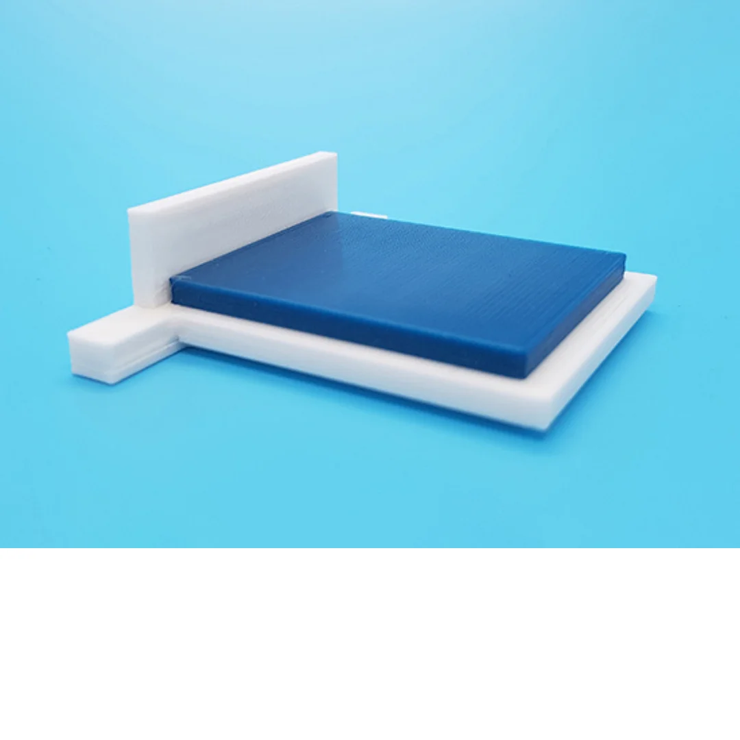 Hazel miniature bed at 1:50 scale, showing its headboard, mattress and base.