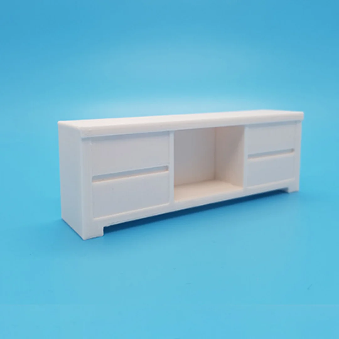 Angled view of the Elegant-8 miniature cabinet at 1:20 scale, showing the central open compartment and side panels.