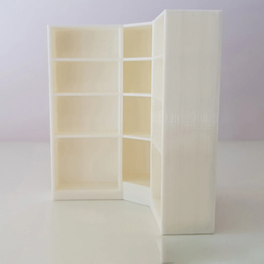 Large Corner Bookshelf miniature model showing its shelving and cabinet design at 1:50 scale.