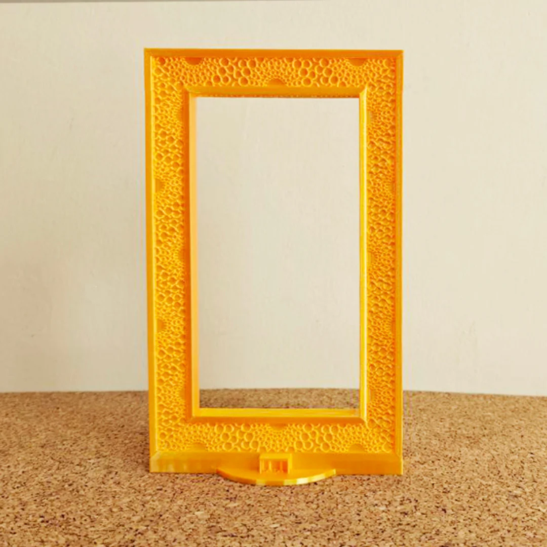 Front view of a Dubai Frame model showing the rectangular opening.