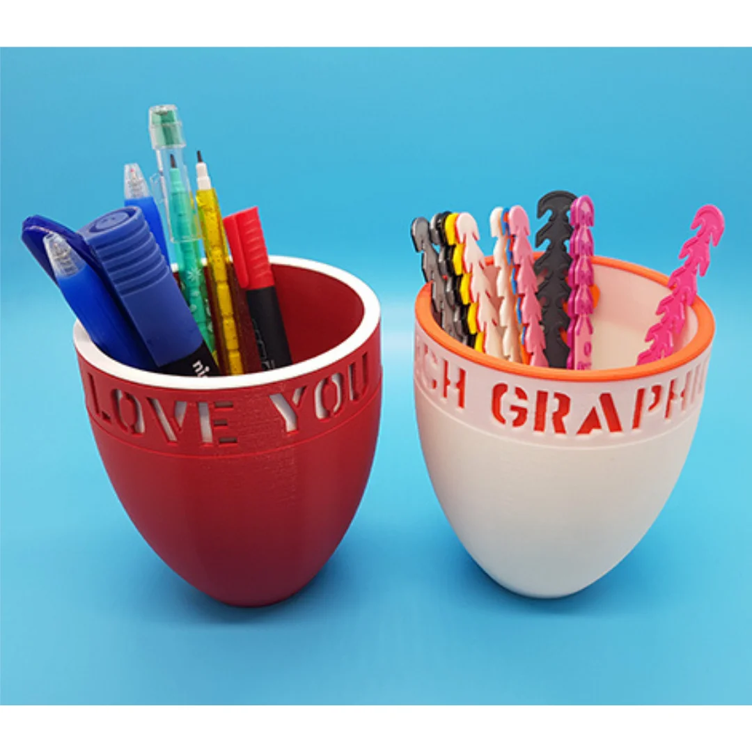 Top angle of personalised desk mugs showing their openings and stationery storage.