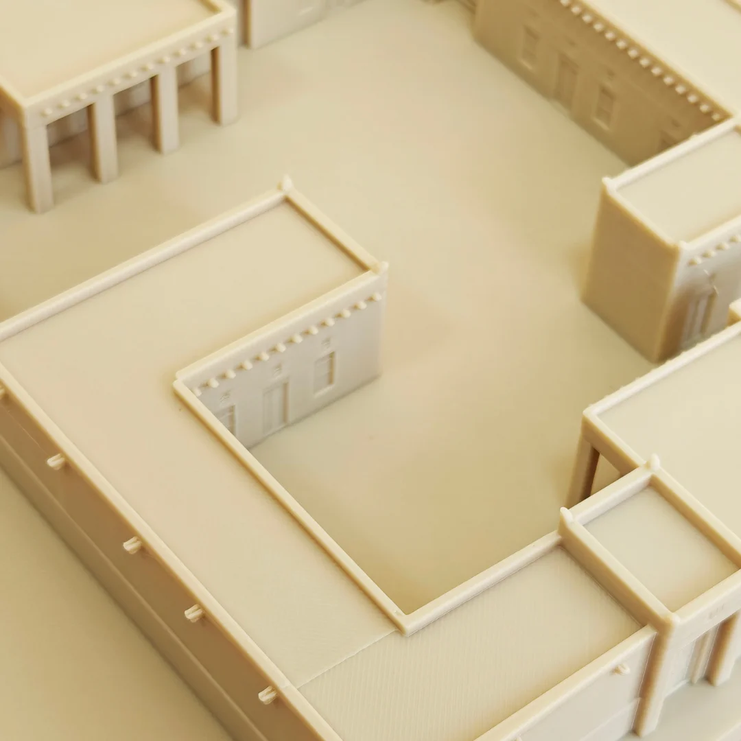 Close view of a Khorfakkan Fort model showing courtyard walls and door details.