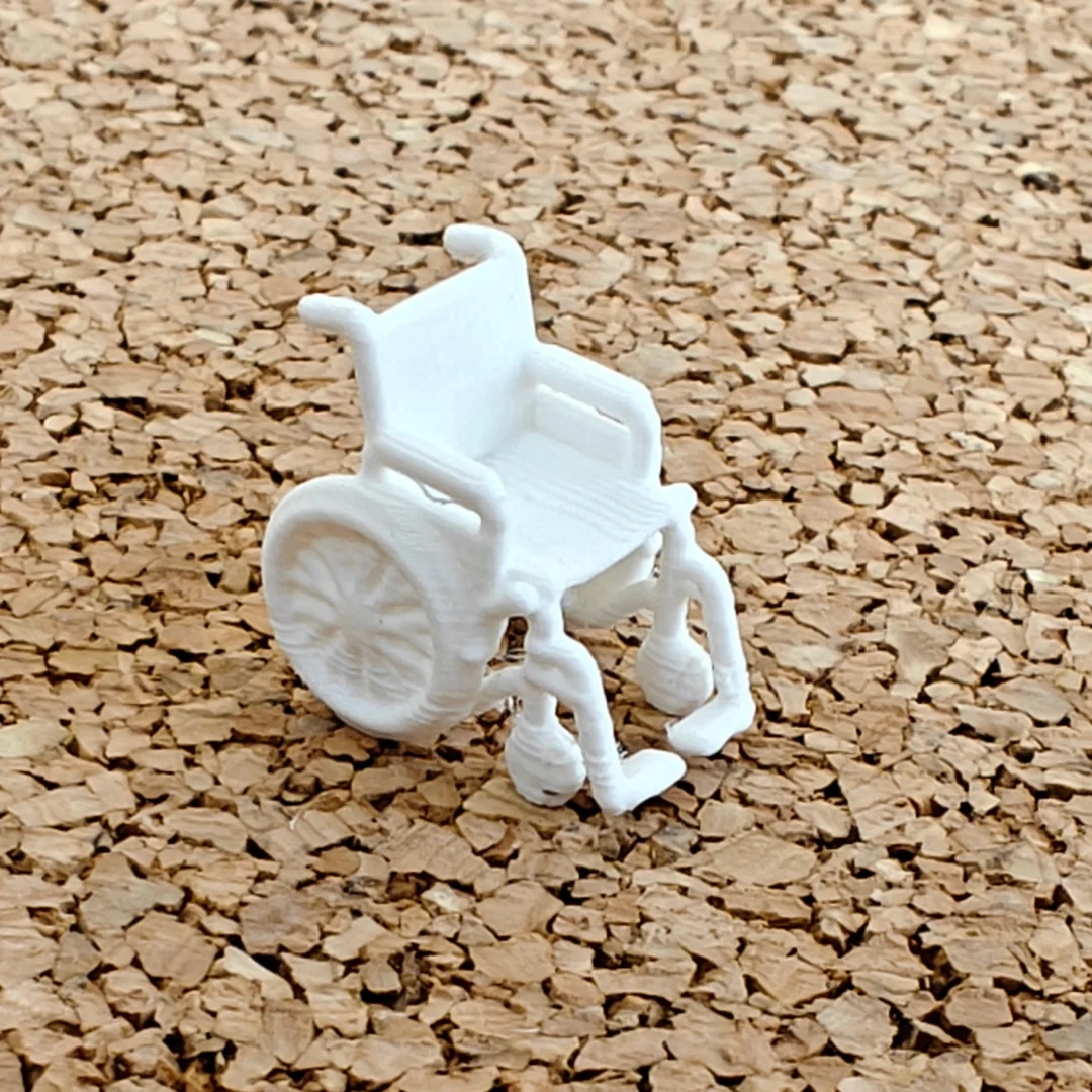 Wheelchair miniature model at 1:50 scale.