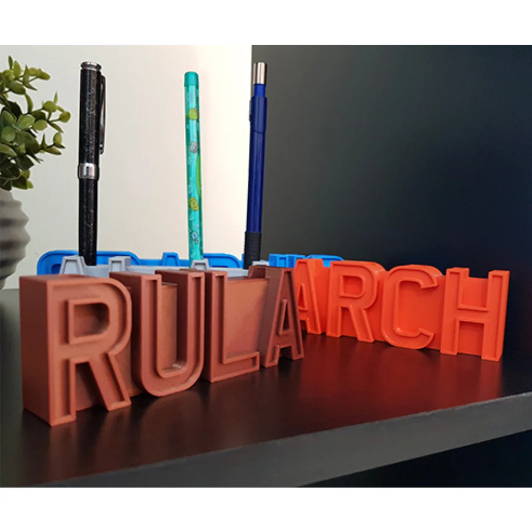 Front view of personalised name pen holders showing lettering and upright pens.