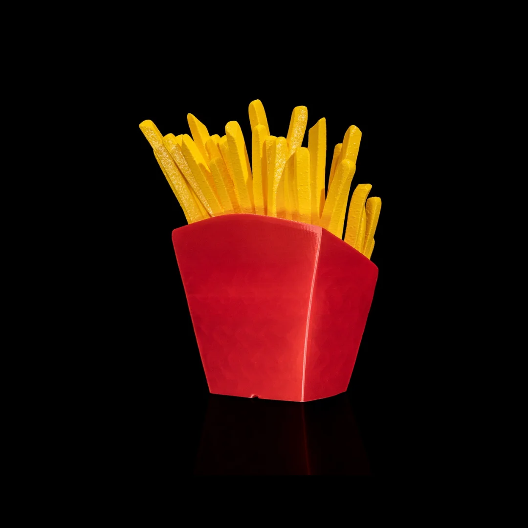 Angled front view of an empty French fries carton phone holder.