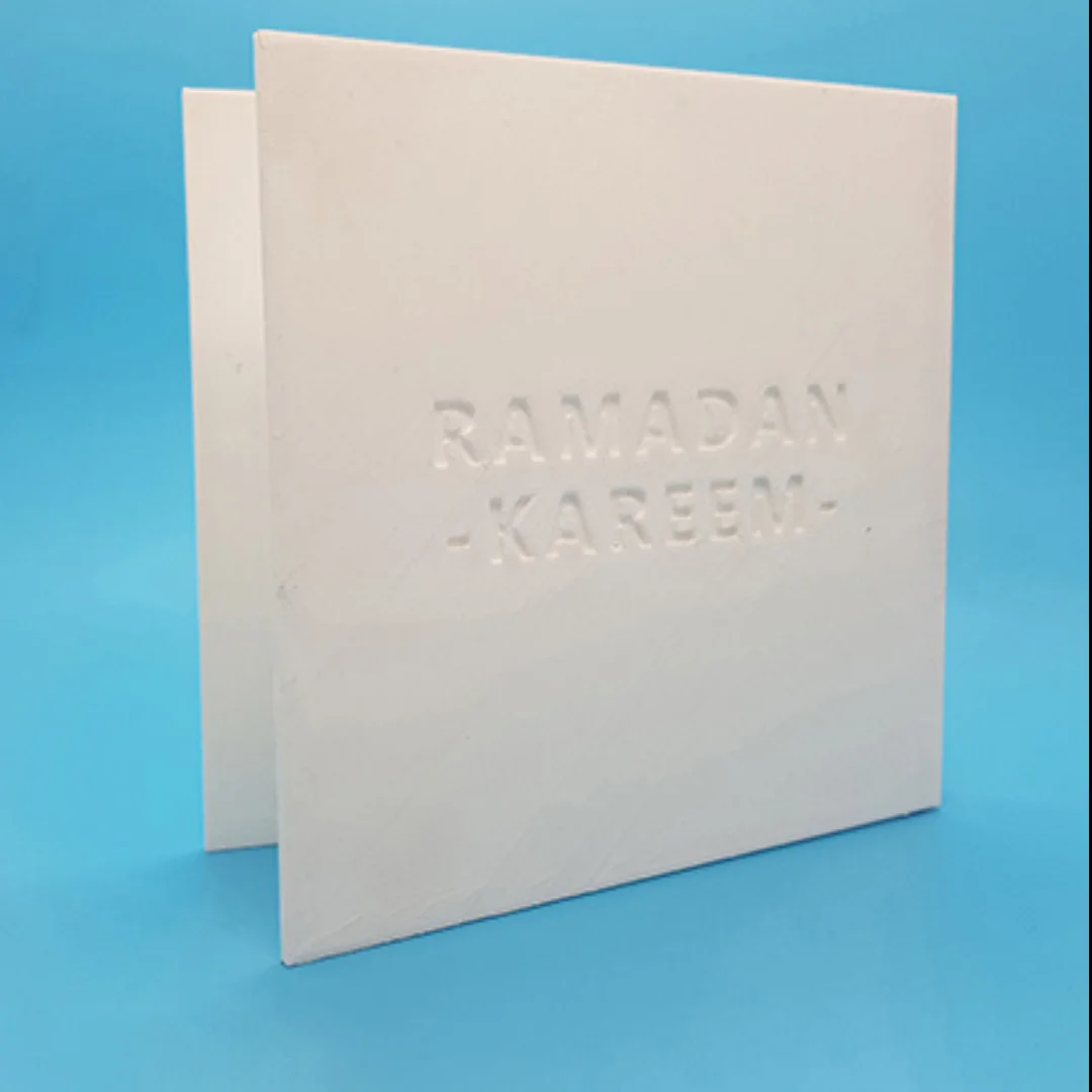Reverse view of a Ramadan card with recessed Ramadan Kareem lettering.