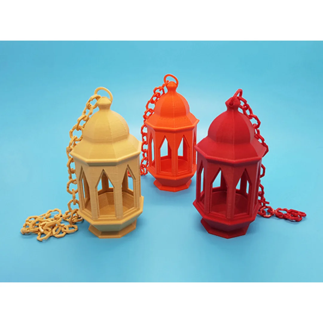 Three Ramadan lanterns viewed from above, showing domed tops, hanging loops and open sides.
