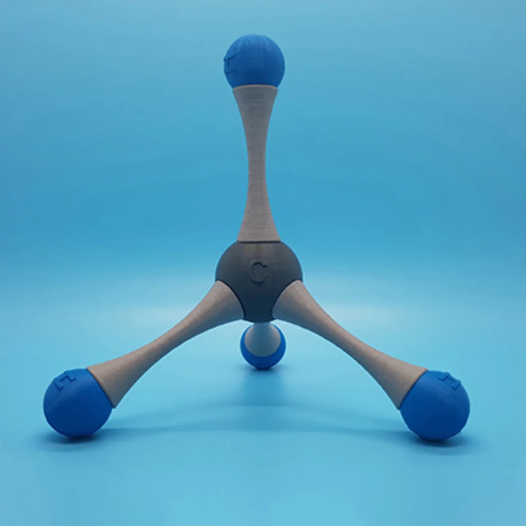 Methane molecule model showing a central atom connected to four outer atoms.