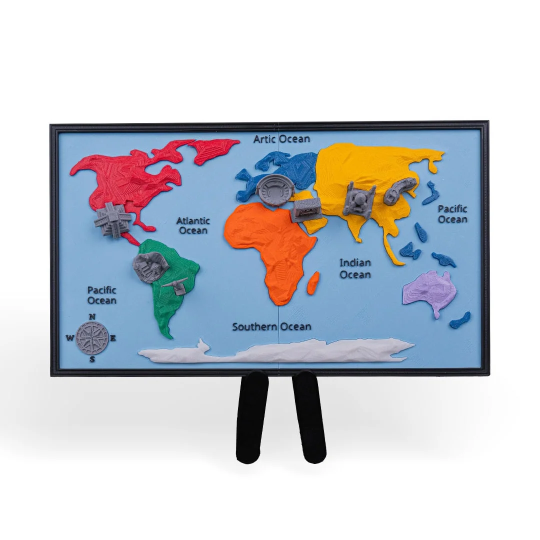 World map teaching model with raised continents and miniature landmarks on a stand.