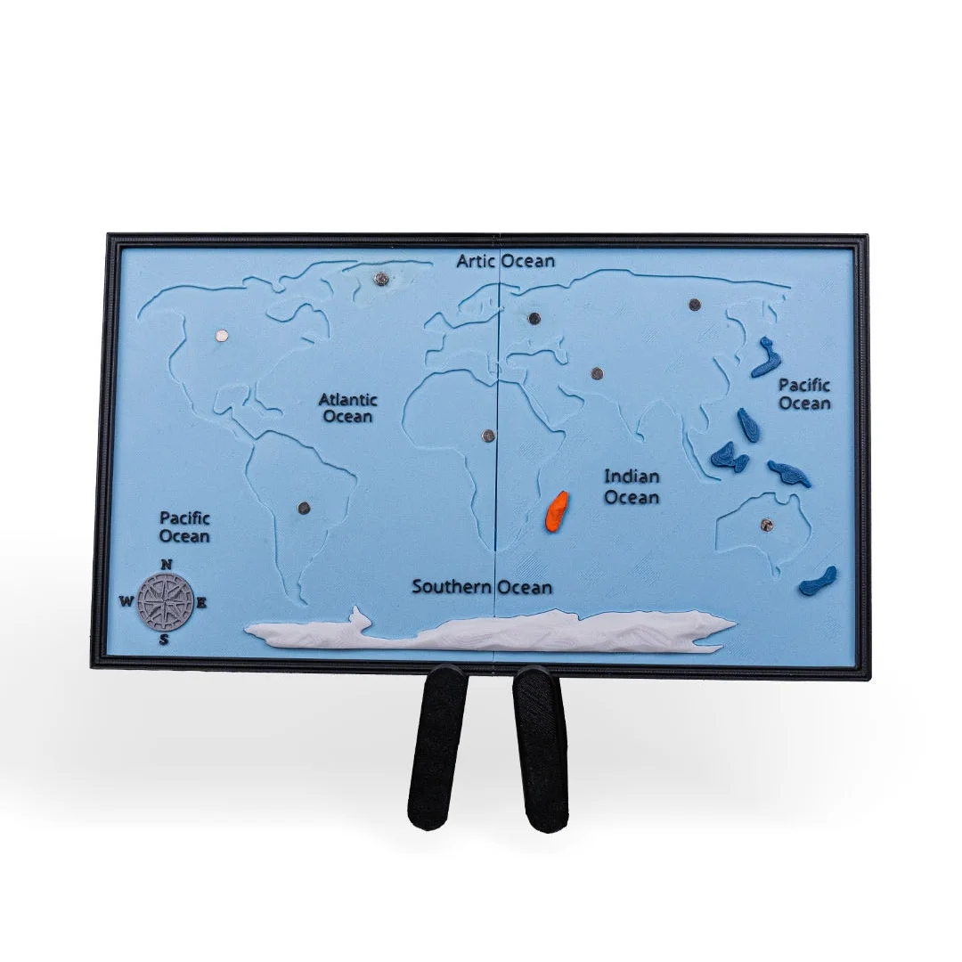 World map model with removable continent pieces and landmarks taken off.