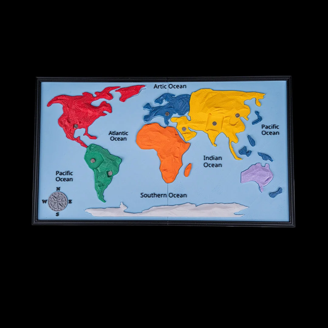 Front view of the world map with continent pieces fitted and landmark pieces removed.
