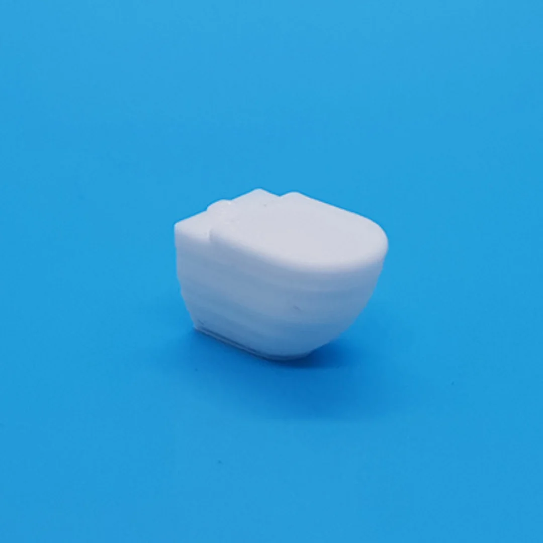 Miniature toilet model at 1:50 scale.