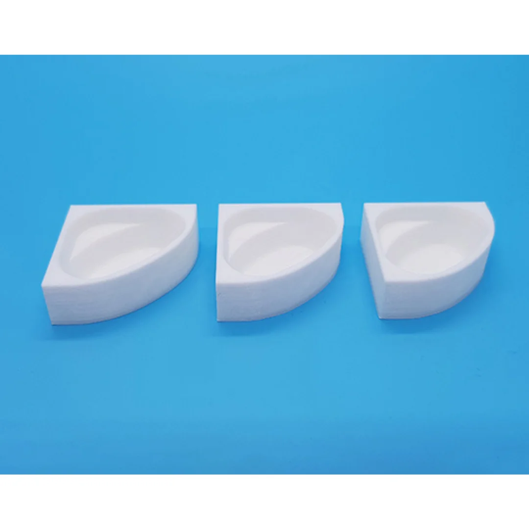 Miniature corner bathtubs displayed together at 1:50 scale.
