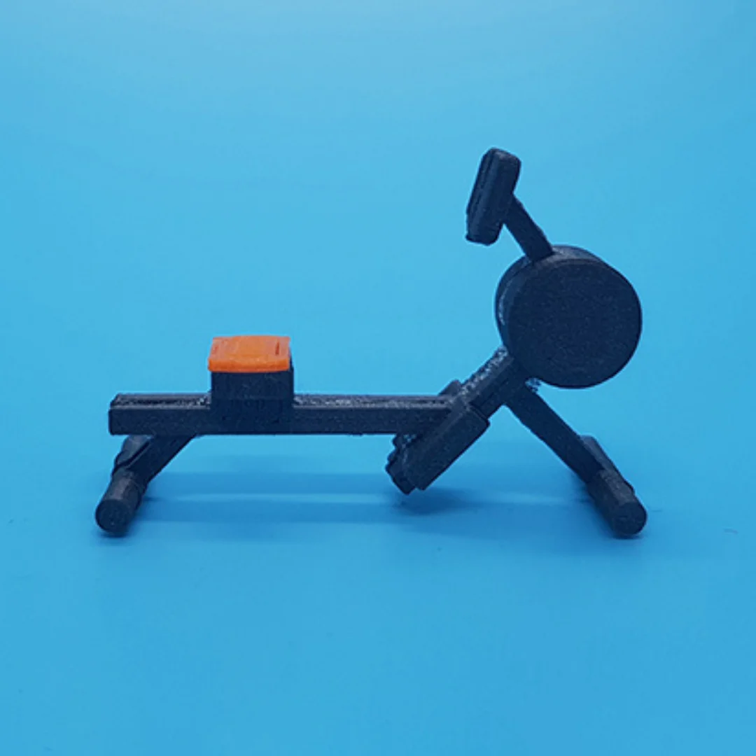 Exercise machine miniature model viewed from the side at 1:50 scale.