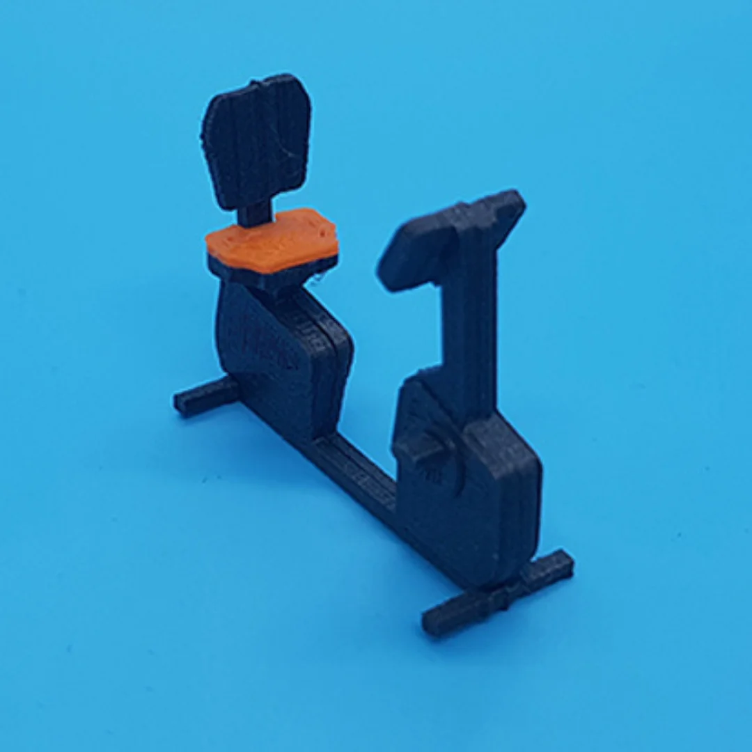 Seated exercise bike miniature model at 1:50 scale.