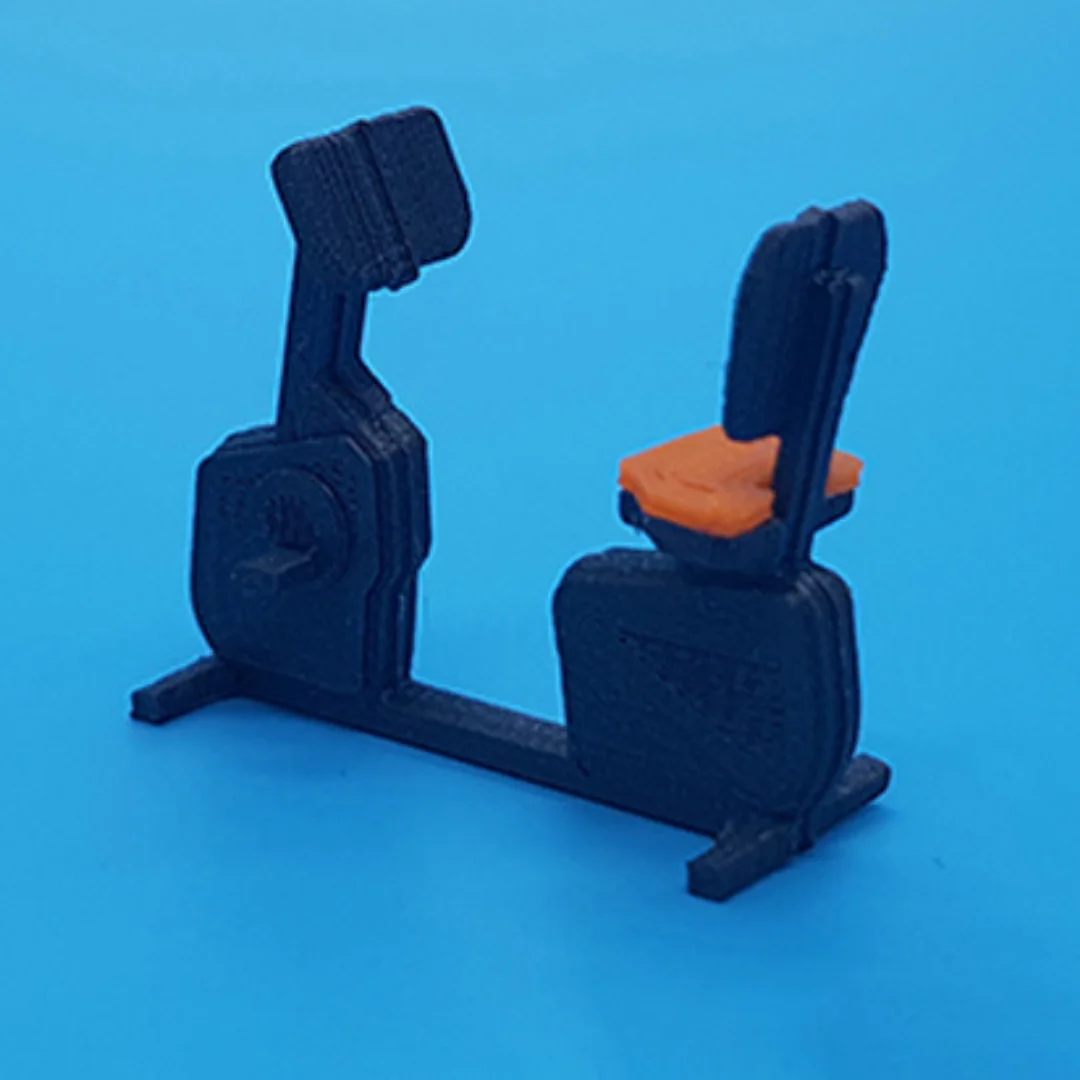 Seated exercise bike miniature model at 1:50 scale.