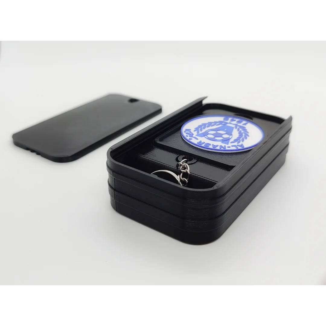 Al-Nasr Emirates keychain displayed inside an open presentation box.