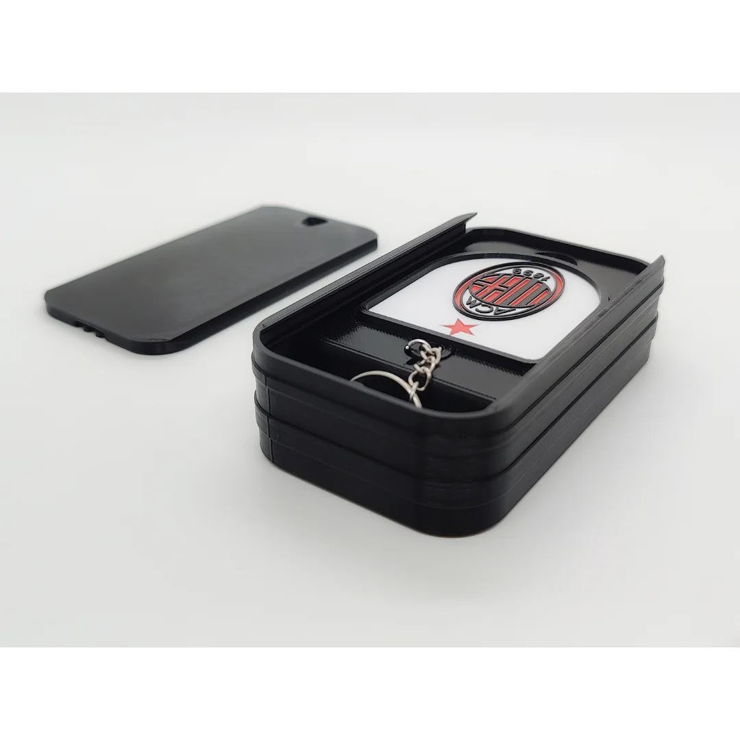 AC Milan keychain displayed inside an open presentation box.