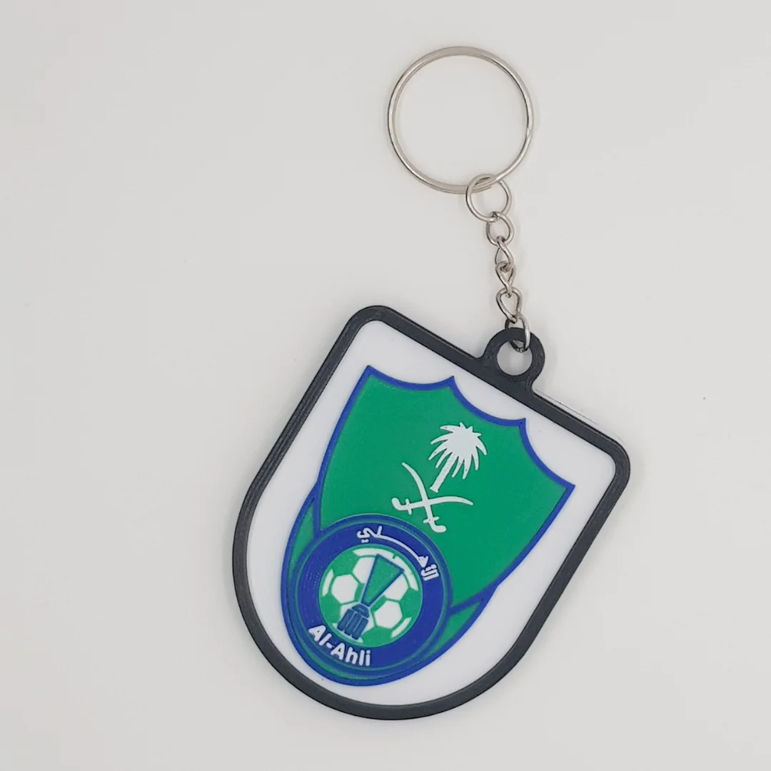 Front view of the Al-Ahli Saudi FC keychain showing the club crest.