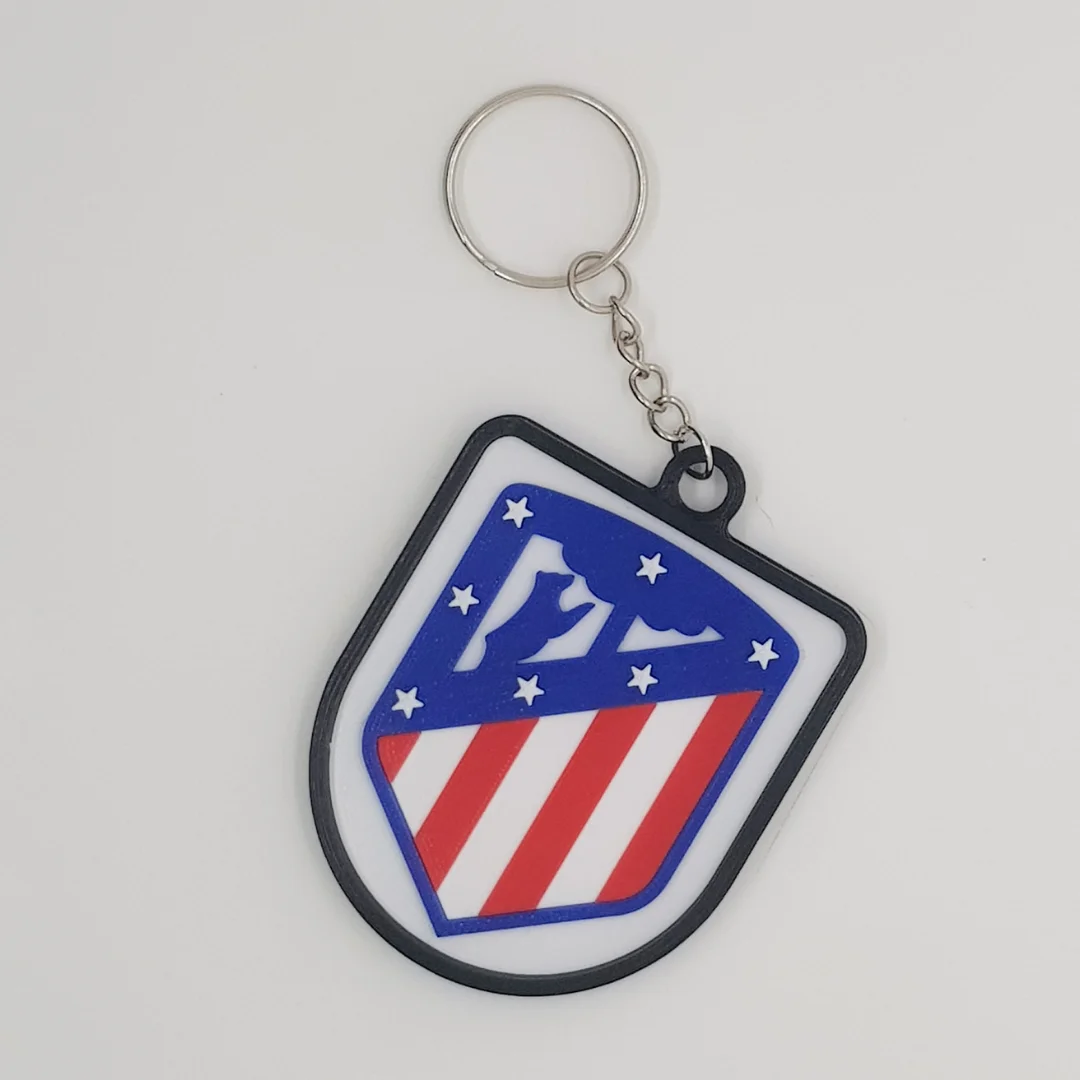 Front view of the Atletico Madrid keychain showing the club crest.