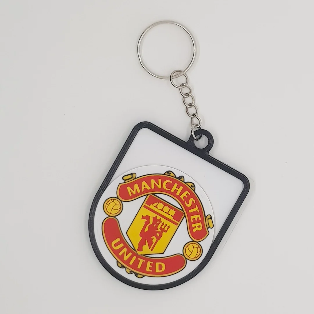 Front view of the Manchester United FC keychain showing the club crest.